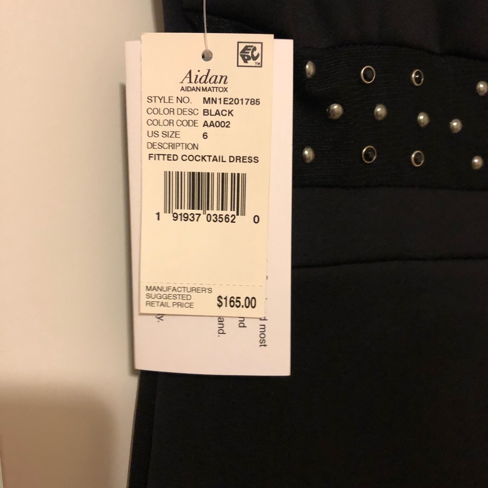 Very cute little black dress with interesting back